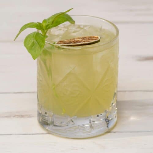 Virgin Basil Smash mocktail with basil garnish