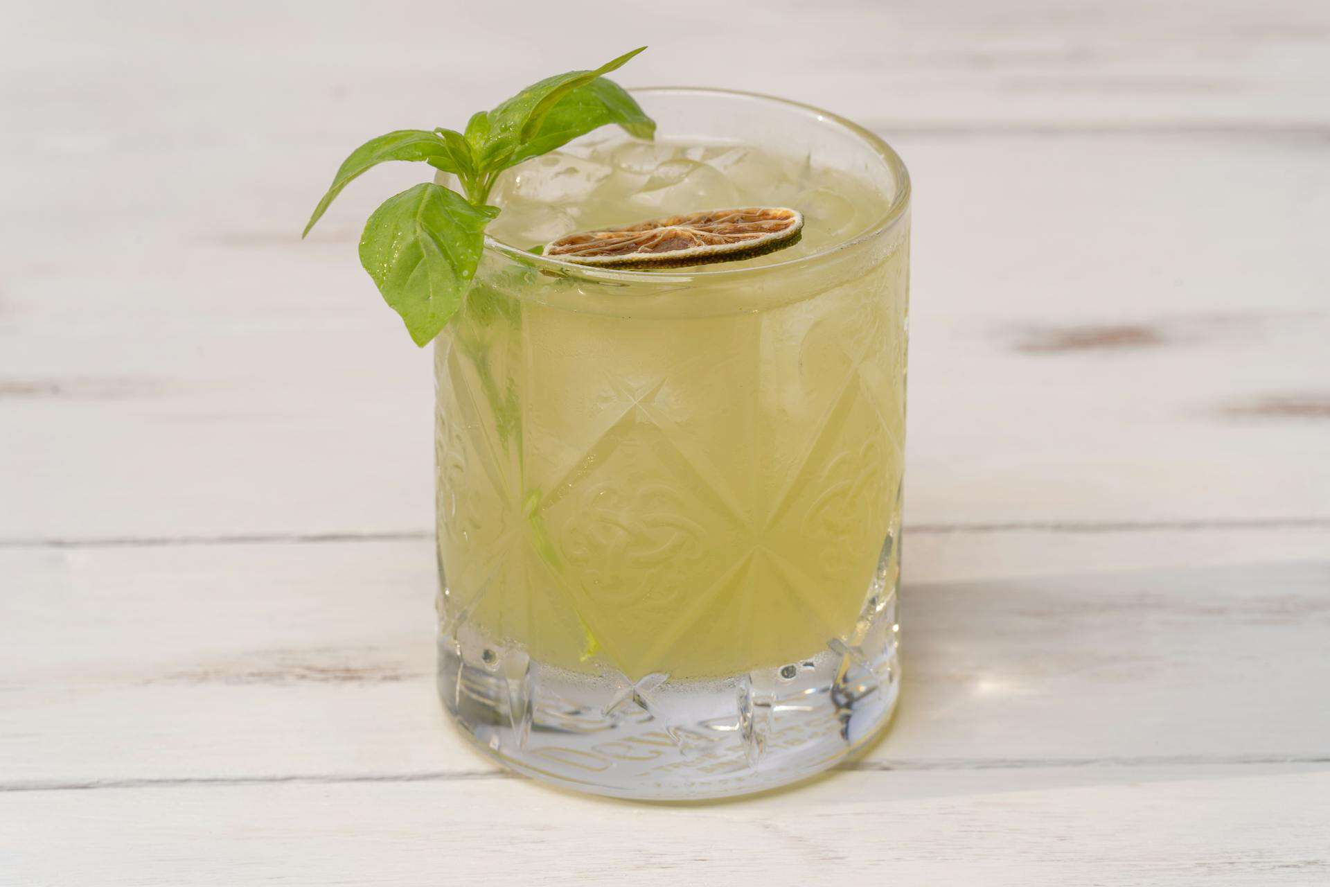 Virgin Basil Smash mocktail with basil garnish